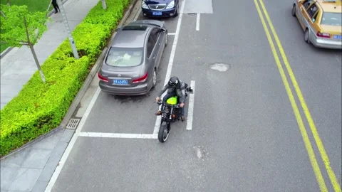 Ride a motorcycle to stop Stock Footage 235267110