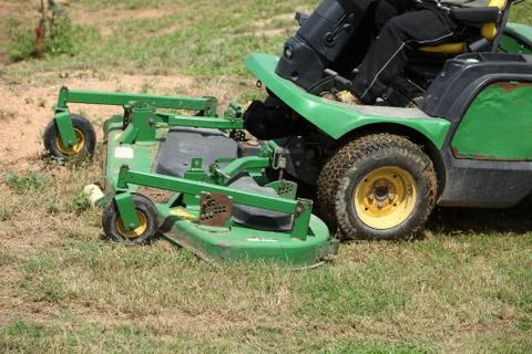 Ride on mower cutting grass Stock Photos