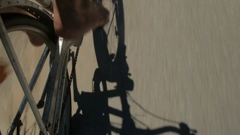 Ride on an old bicycle. Reflection shade from the road. Stock-Footage 70210989