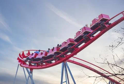 Ride a roller coaster against the sky Stock Photos