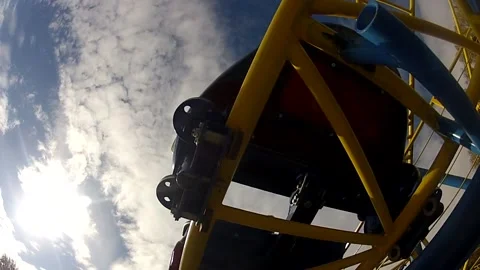 Ride on roller coaster in amusement park sky background Stock Footage 164178665
