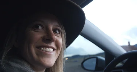 Ride share driver greets front seat passenger and starts trip with phone Video stock 88340889