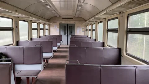 Ride on a suburban electric train in an empty car Video stock 131446629