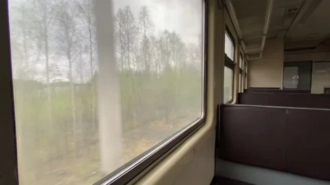 Ride on a suburban electric train in an empty car Stock-Footage 131447032