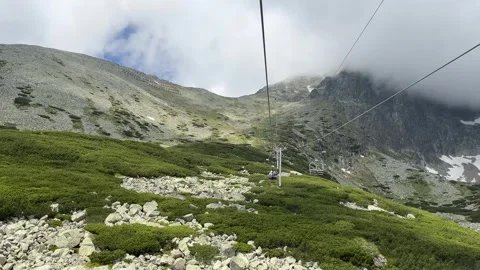 Ride on a two-seater cable car with a beautiful view of the surroundings Stock Footage 278352560