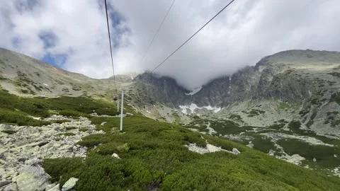 Ride on a two-seater cable car with a beautiful view of the surroundings Stock Footage 278352746