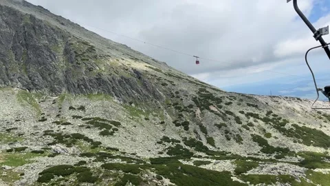 Ride on a two-seater cable car with a beautiful view of the surroundings Stock Footage 278355297
