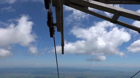 Ride on a two-seater cable car with a beautiful view of the surroundings Stock Footage 278471774