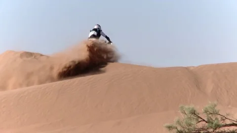 Rider crosses the dune Stock Footage 76433475