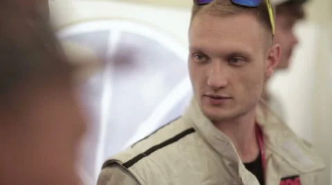 Rider discussing something with the team Video stock 68087214