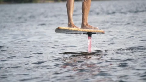 Rider on foil board Stockbeeldmateriaal 255618809