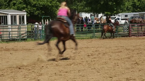 Rider Gallops through Shot Stock Footage 50142061