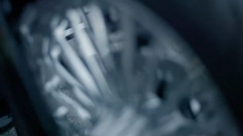 Rider getting ready to drive Harley-Davidson motorbike in slow motion Stock Footage 89979193