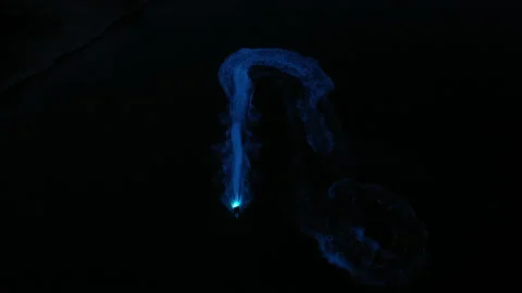 Rider on a jet ski with lights creating wake aerial night shot  Stock Footage 142298280
