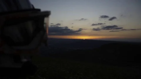 Rider looks at the sunset 2 Stock Footage 77343886