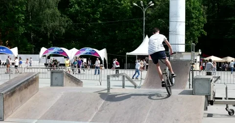 A rider performs stunts on a bike Stock Footage 64820482
