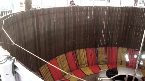 Rider performs on a vertical circular track. Stock Footage 262496277