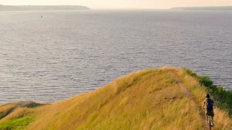 the rider slides down the slope of the c... | Stock Video | Pond5