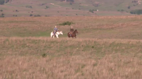 Riders In The Distance Stock Footage 36280471