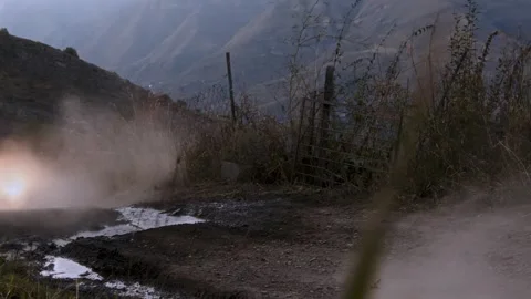 The riders navigate through sharp inclines and steep descents, their skills and Stock Footage 248076820