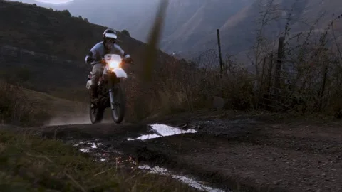 The riders navigate through sharp inclines and steep descents, their skills and Stock Footage 248599944