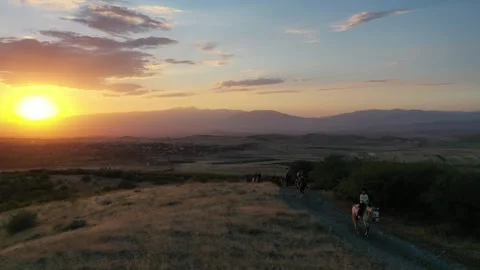 The riders pass through the field 5 스톡 동영상 331535287