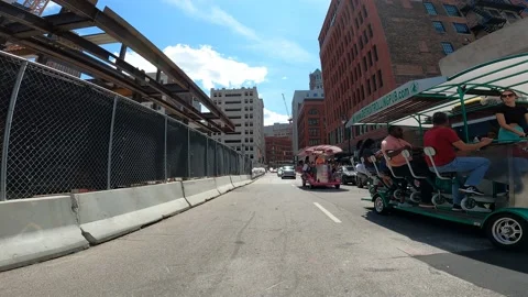 Riders Peddling on a Rolling Pub in 4K Detroit, Michigan Stock-Footage 156989609