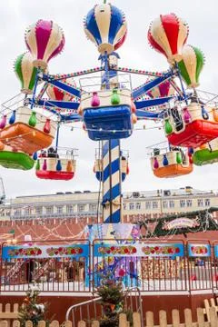 The rides at the fair on red square. Stock Photos
