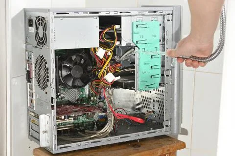 Ridiculous computer cleaning. Stock Photos
