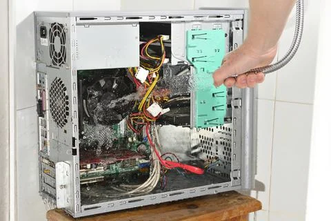 Ridiculous computer cleaning. Stock Photos