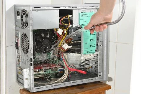 Ridiculous computer cleaning. Stock Photos