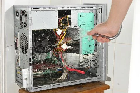 Ridiculous computer cleaning. Stock Photos