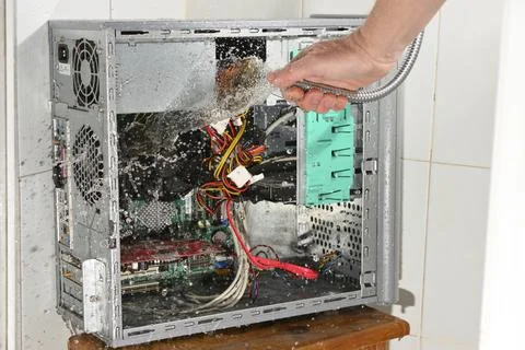 Ridiculous computer cleaning. Stock Photos