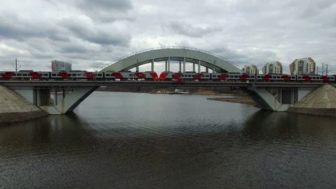 Riding across the bridge over the river train Stock Footage 83468550