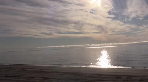 Riding an ATV on the beach Stock Footage 55576278