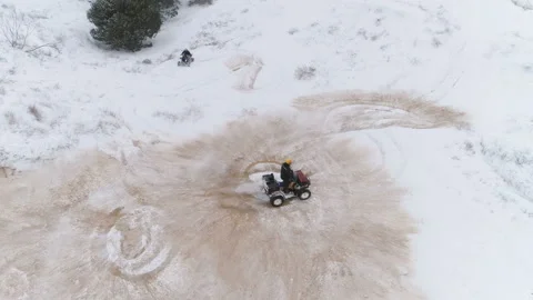 Riding An Atv Enters The Drift Through The Snow, Slides. Extreme Driving 스톡 동영상 100995749