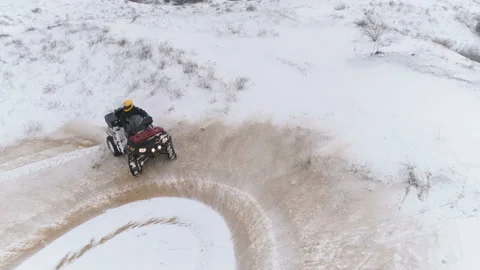 Riding An Atv Enters The Drift Through The Snow, Slides. Stock-Footage 100996212