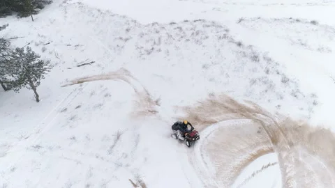 Riding An Atv Enters The Drift Through The Snow, Slides. Stock-Footage 100996403