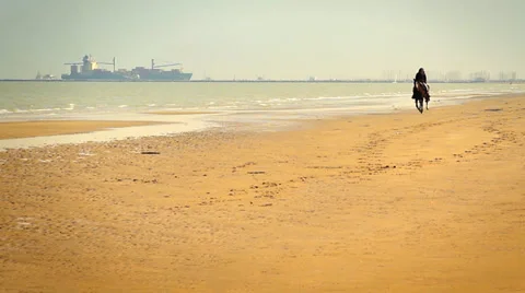 Riding on the beach Stock Footage 36917221