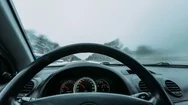 Riding Behind The Wheel Of A Car In Winter Time Lapse Video Stock Footage