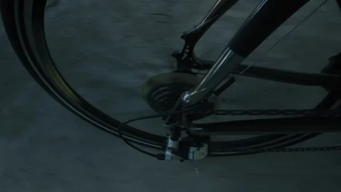Riding bicycle in the dark Stock Footage 312237850