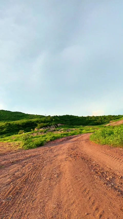 Riding a bicycle up a hill Stock Footage 342691333