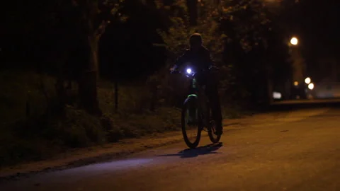 Riding a bicycle at night Stock Footage 241243250