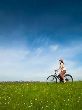 Riding a bicycle Stock Photos