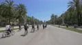 Riding bike and playing with soap bubbles in the park in Barcelona 4k or 4k+ Resolution