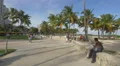 Riding bike and skateboarding on the beach side, Miami Beach 4k or 4k+ Resolution
