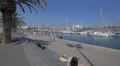 Riding bike and walking in Barcelona's harbor 4k or 4k+ Resolution