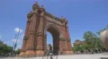 Riding bike around Arc de Triomf in Barcelona 4k or 4k+ Resolution