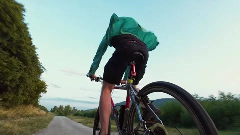 Riding a bike in the evening Stock Footage 314623387