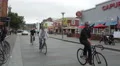 Riding bike on Jefferson Street, San Francisco 4k or 4k+ Resolution